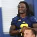 Michigan senior running back Vincent Smith smiles during media day at the Al Glick Field House on Sunday afternoon. Melanie Maxwell I AnnArbor.com